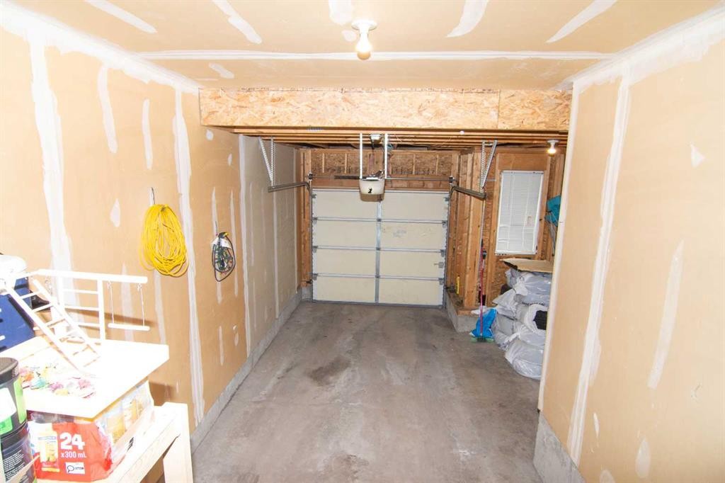 754 Luxstone Gate Sw, Airdrie, AB - Indoor Photo Showing Garage