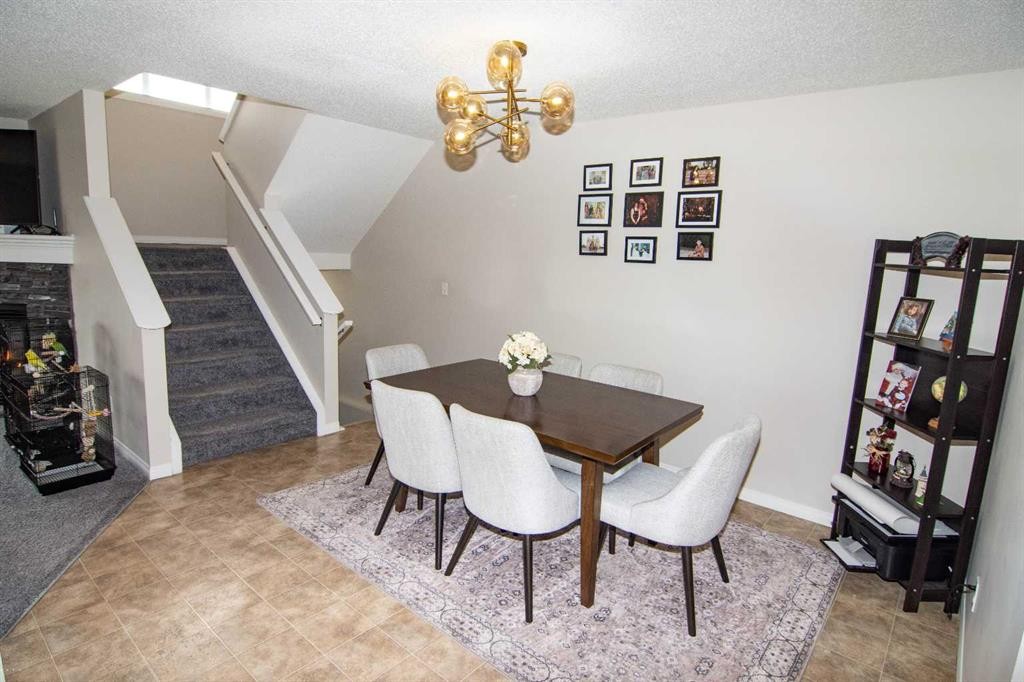 754 Luxstone Gate Sw, Airdrie, AB - Indoor Photo Showing Dining Room