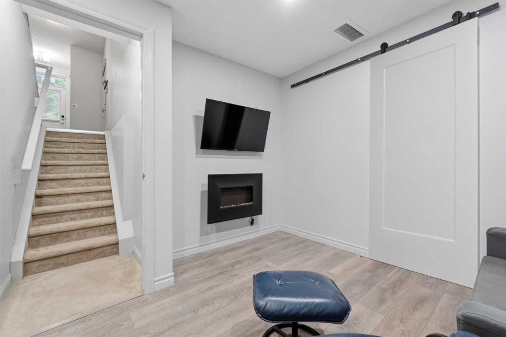 804 Wentworth Villas Sw, Calgary, AB - Indoor With Fireplace