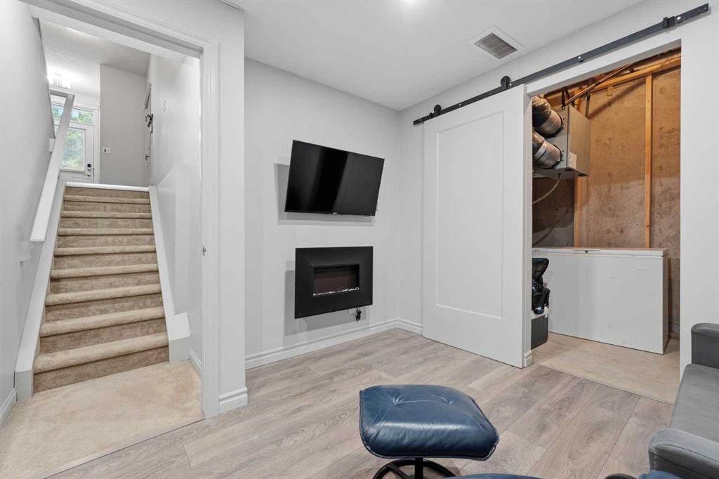 804 Wentworth Villas Sw, Calgary, AB - Indoor With Fireplace