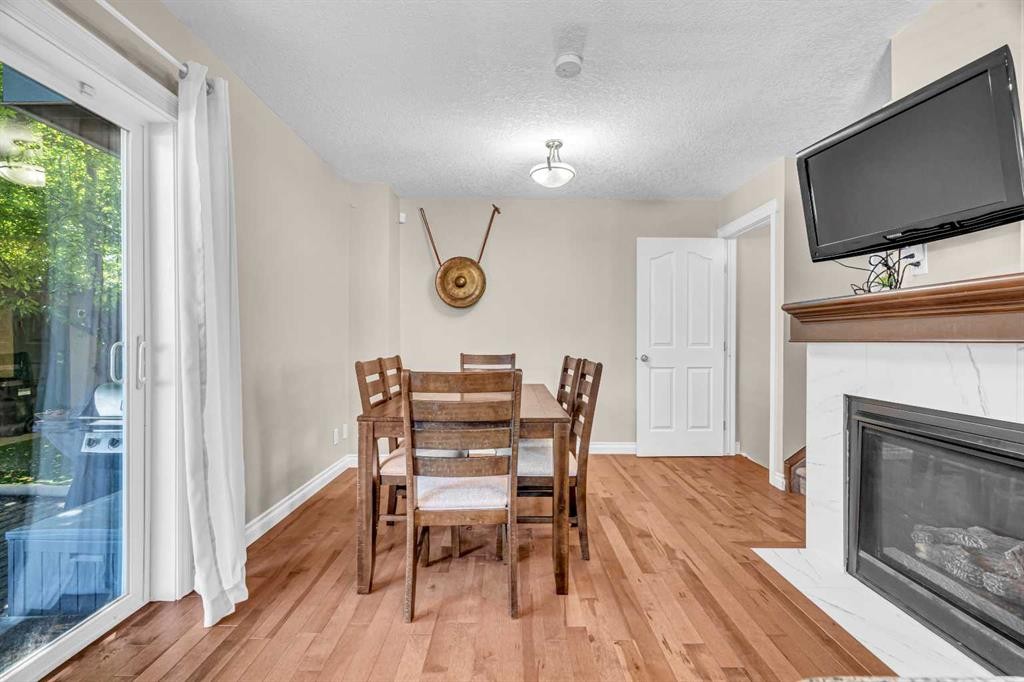 2-821 Mcdougall Road Ne, Calgary, AB - Indoor With Fireplace