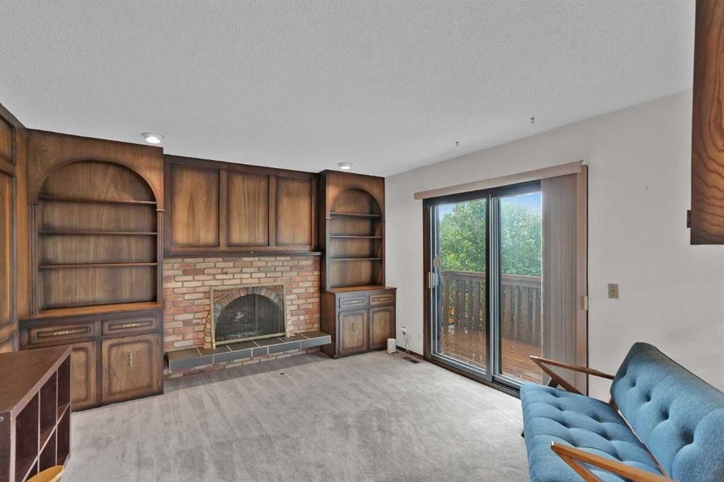 60 Beddington Drive Ne, Calgary, AB - Indoor Photo Showing Living Room With Fireplace