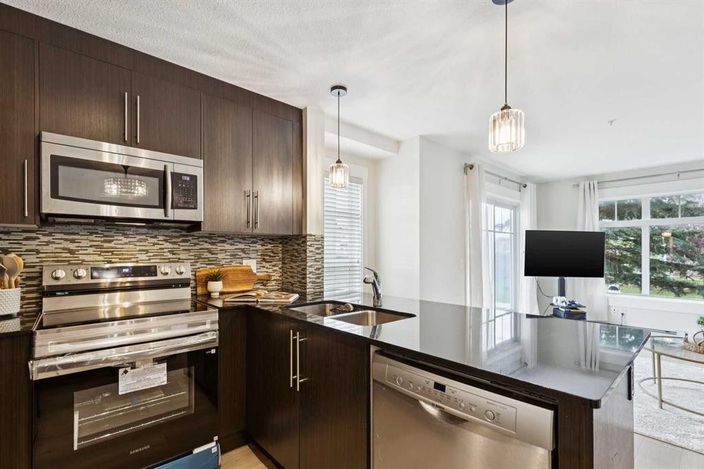 4108-155 Skyview Ranch Way Ne, Calgary, AB - Indoor Photo Showing Kitchen With Double Sink With Upgraded Kitchen