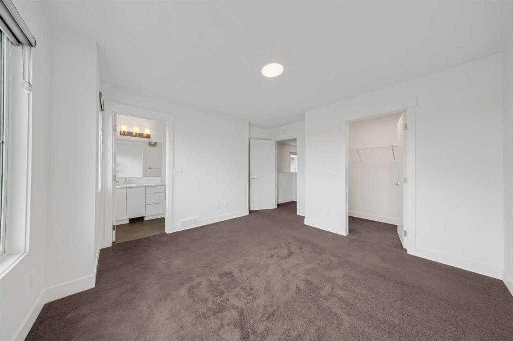 242 Carrington Gate Nw, Calgary, AB - Indoor Photo Showing Other Room