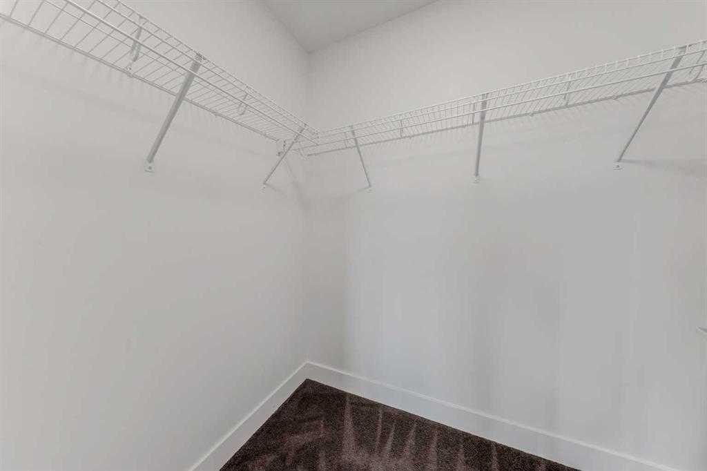 242 Carrington Gate Nw, Calgary, AB - Indoor With Storage