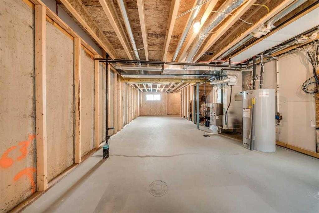 242 Carrington Gate Nw, Calgary, AB - Indoor Photo Showing Basement