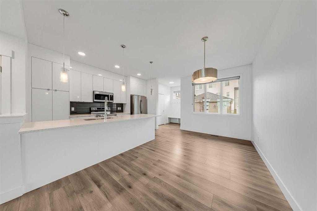 242 Carrington Gate Nw, Calgary, AB - Indoor Photo Showing Kitchen With Upgraded Kitchen