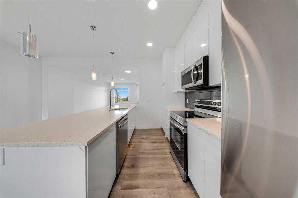 242 Carrington Gate Nw, Calgary, AB - Indoor Photo Showing Kitchen With Upgraded Kitchen