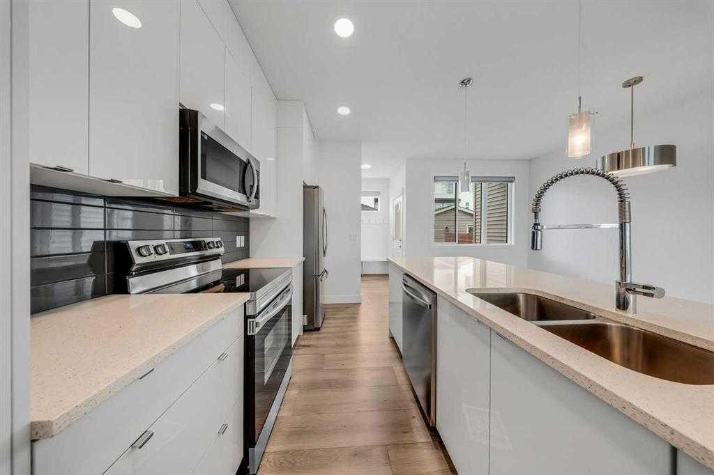 242 Carrington Gate Nw, Calgary, AB - Indoor Photo Showing Kitchen With Double Sink With Upgraded Kitchen