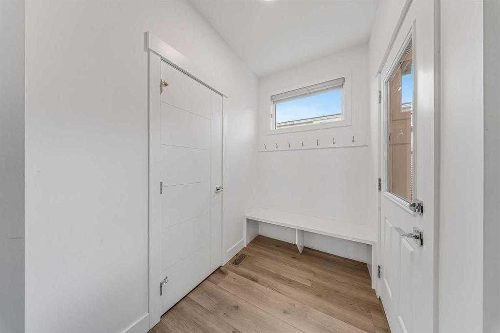 242 Carrington Gate Nw, Calgary, AB - Indoor Photo Showing Other Room