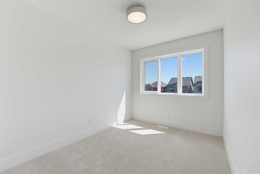 2465 Creeker Lane, Airdrie, AB - Indoor Photo Showing Other Room
