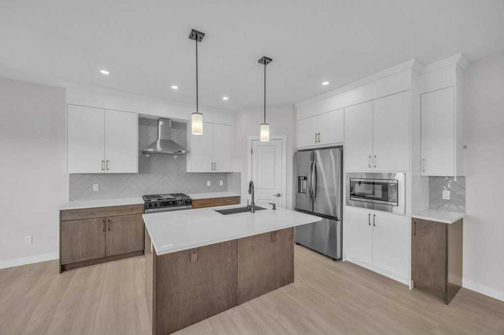 203 Homestead Common Ne, Calgary, AB - Indoor Photo Showing Kitchen With Stainless Steel Kitchen With Upgraded Kitchen