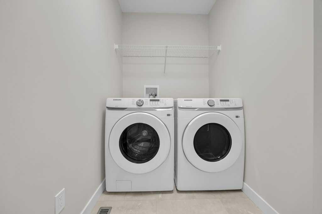 203 Homestead Common Ne, Calgary, AB - Indoor Photo Showing Laundry Room