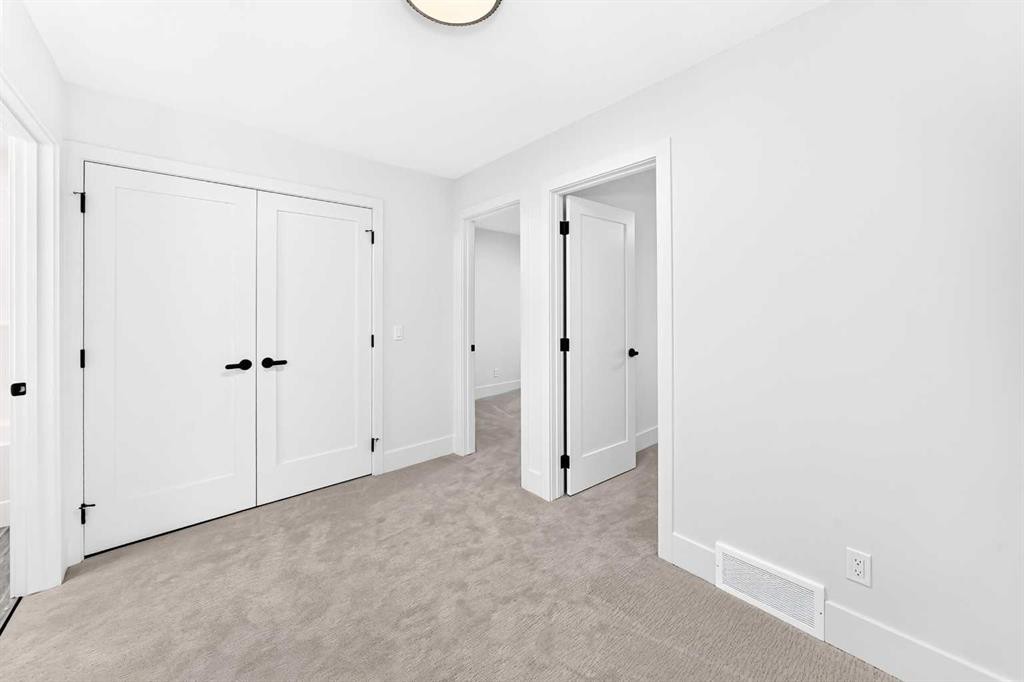 2473 Creeker Lane, Airdrie, AB - Indoor Photo Showing Other Room