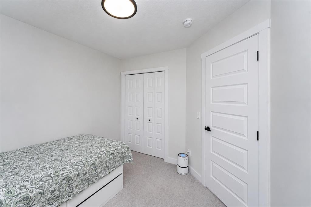 52 Lewiston Drive Ne, Calgary, AB - Indoor Photo Showing Bedroom