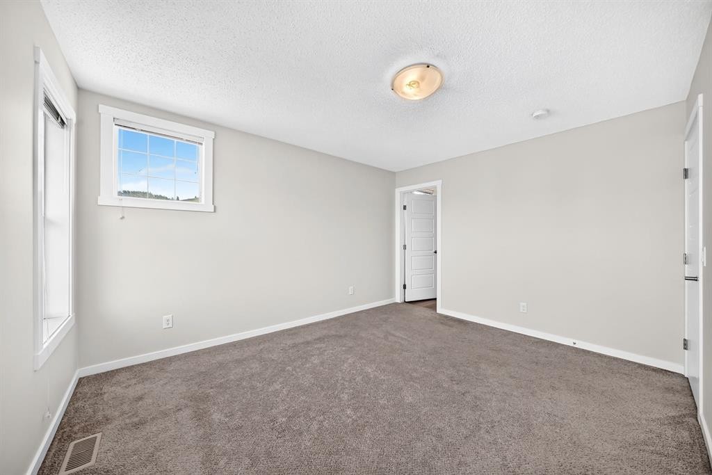 428 Cranbrook Square Se, Calgary, AB - Indoor Photo Showing Other Room