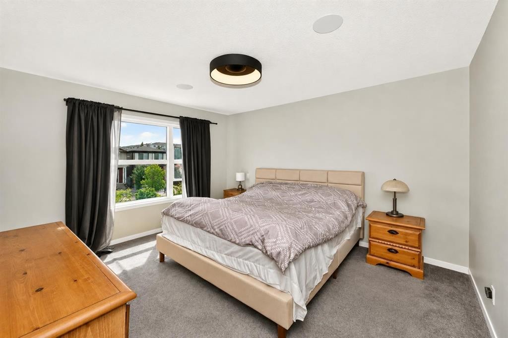 23 Lucas Boulevard Nw, Calgary, AB - Indoor Photo Showing Bedroom