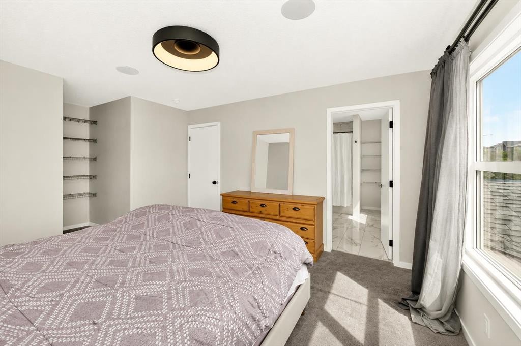 23 Lucas Boulevard Nw, Calgary, AB - Indoor Photo Showing Bedroom