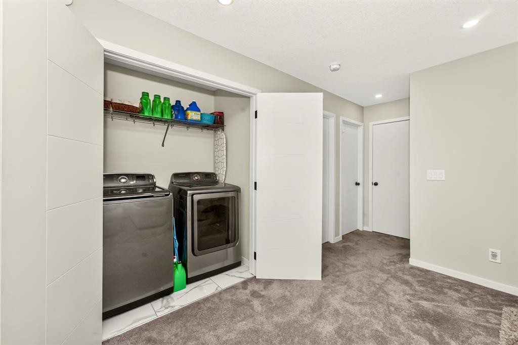 23 Lucas Boulevard Nw, Calgary, AB - Indoor Photo Showing Laundry Room