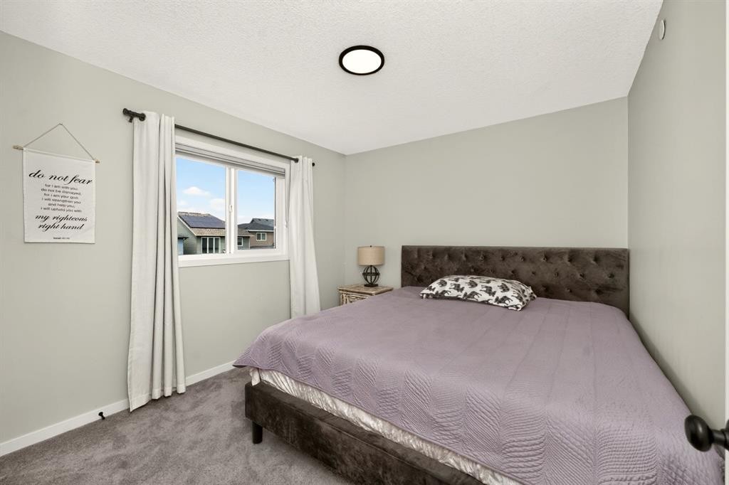 23 Lucas Boulevard Nw, Calgary, AB - Indoor Photo Showing Bedroom