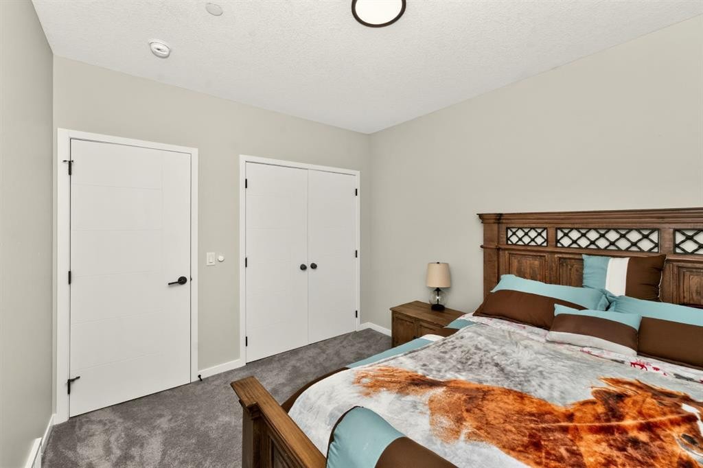 23 Lucas Boulevard Nw, Calgary, AB - Indoor Photo Showing Bedroom