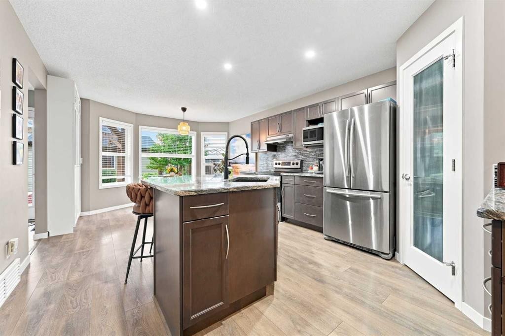 106 Autumn Crescent Se, Calgary, AB - Indoor Photo Showing Kitchen With Stainless Steel Kitchen With Upgraded Kitchen