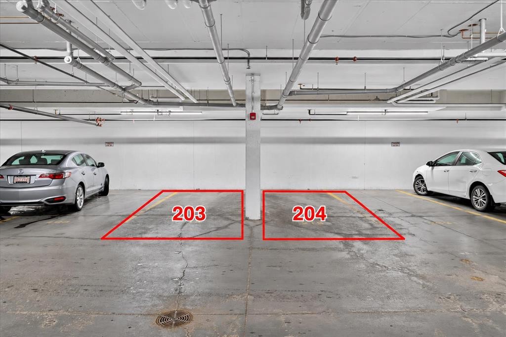 406-4350 Seton Drive Se, Calgary, AB - Indoor Photo Showing Garage