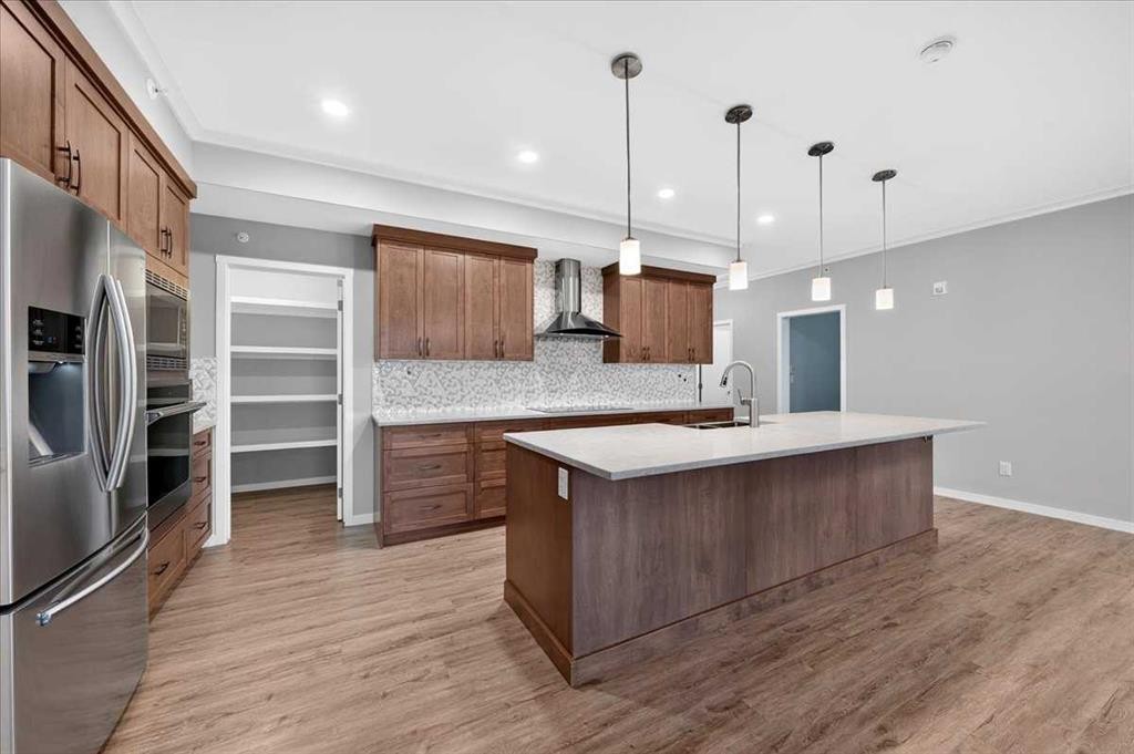 406-4350 Seton Drive Se, Calgary, AB - Indoor Photo Showing Kitchen With Stainless Steel Kitchen With Upgraded Kitchen