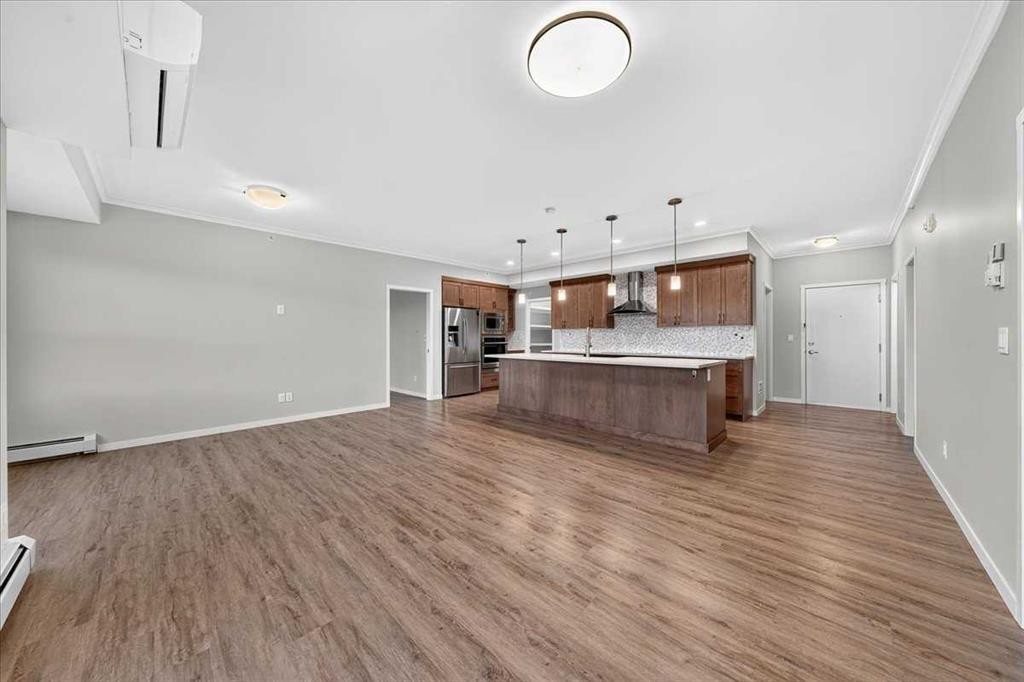 406-4350 Seton Drive Se, Calgary, AB - Indoor Photo Showing Kitchen
