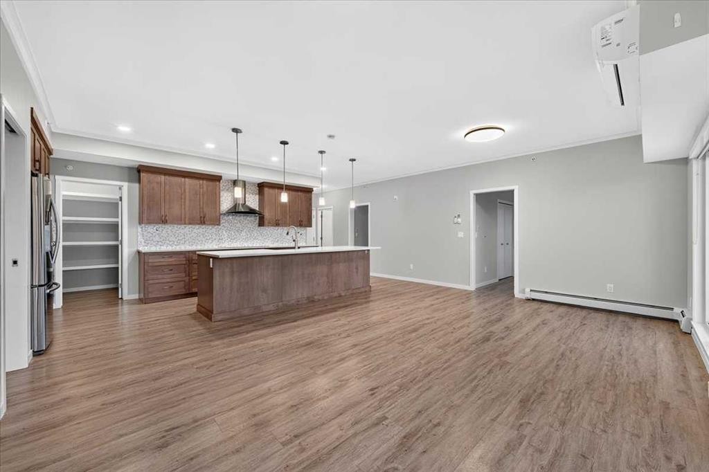 406-4350 Seton Drive Se, Calgary, AB - Indoor Photo Showing Kitchen