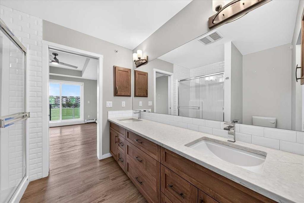 406-4350 Seton Drive Se, Calgary, AB - Indoor Photo Showing Bathroom