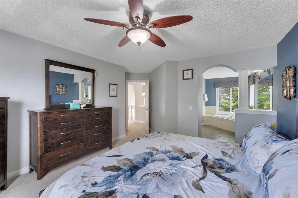 169 West Creek Boulevard, Chestermere, AB - Indoor Photo Showing Bedroom