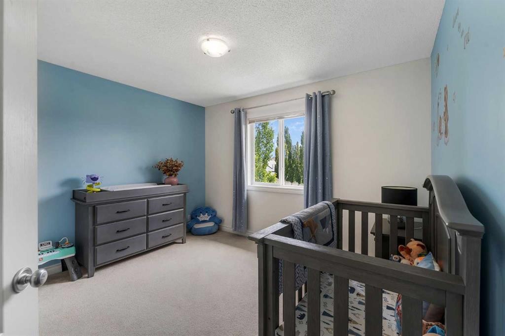 169 West Creek Boulevard, Chestermere, AB - Indoor Photo Showing Bedroom