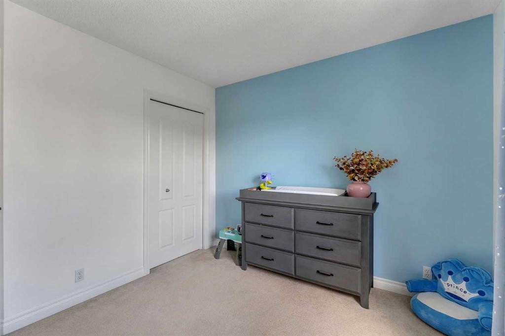 169 West Creek Boulevard, Chestermere, AB - Indoor Photo Showing Bedroom