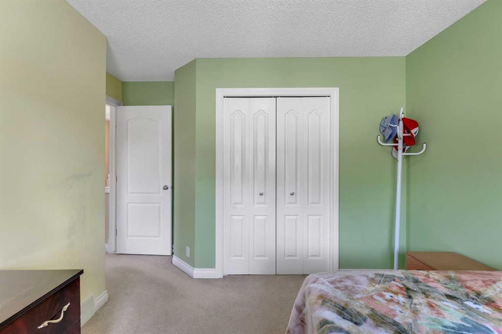 169 West Creek Boulevard, Chestermere, AB - Indoor Photo Showing Bedroom