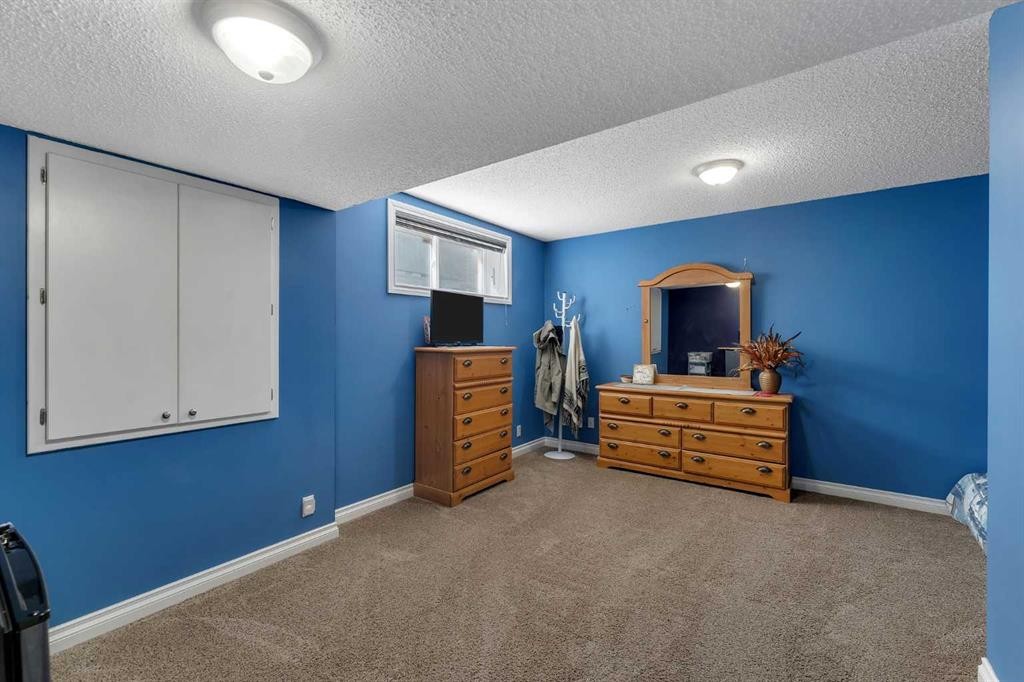 169 West Creek Boulevard, Chestermere, AB - Indoor Photo Showing Bedroom