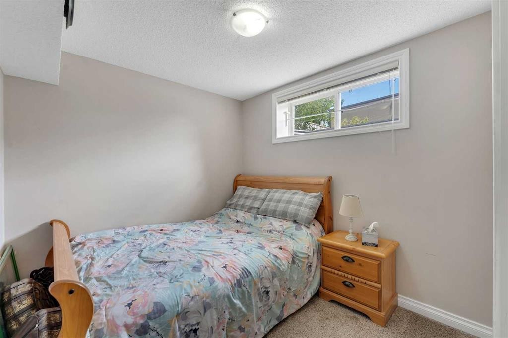 169 West Creek Boulevard, Chestermere, AB - Indoor Photo Showing Bedroom