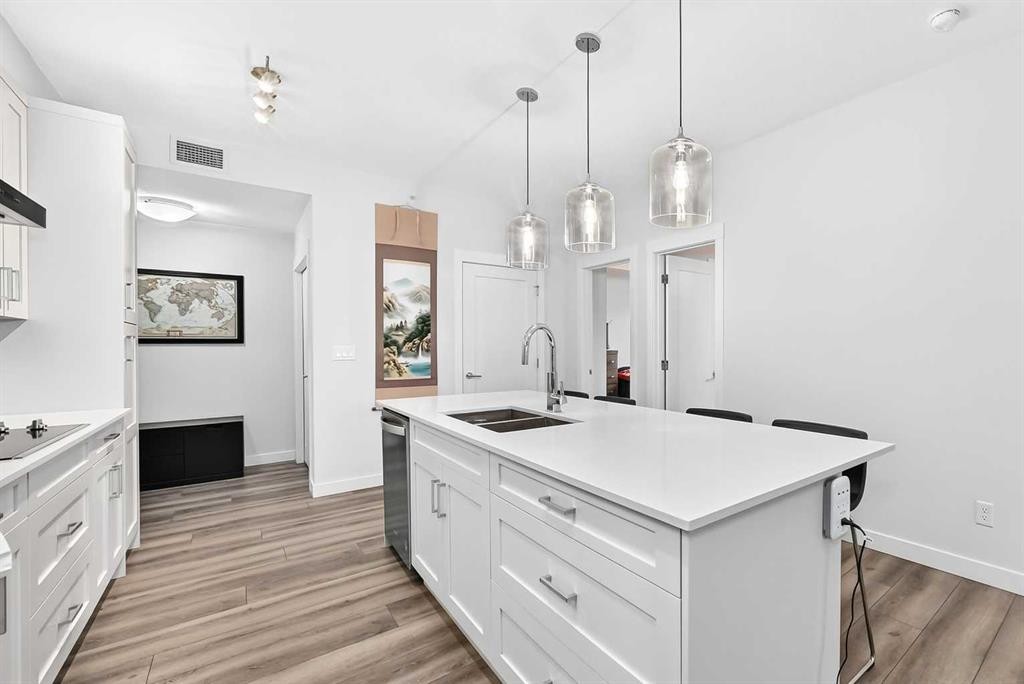 409-30 Walgrove Se, Calgary, AB - Indoor Photo Showing Kitchen With Double Sink With Upgraded Kitchen