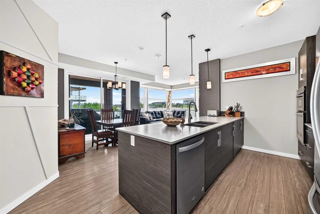 201-122 Mahogany Centre Se, Calgary, AB - Indoor Photo Showing Kitchen With Double Sink