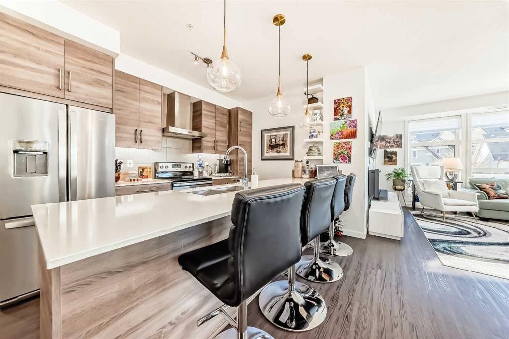 202-122 Mahogany Centre Se, Calgary, AB - Indoor Photo Showing Kitchen With Upgraded Kitchen