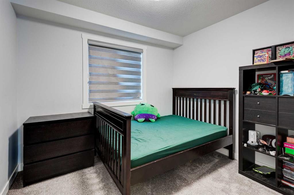 768 Edgefield Crescent, Strathmore, AB - Indoor Photo Showing Bedroom