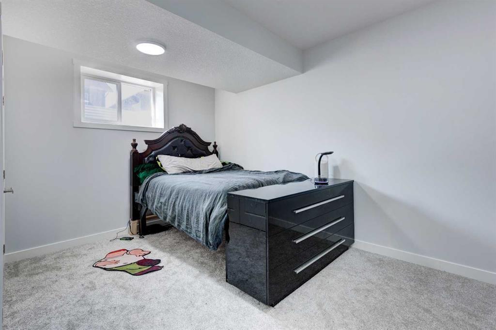 768 Edgefield Crescent, Strathmore, AB - Indoor Photo Showing Bedroom
