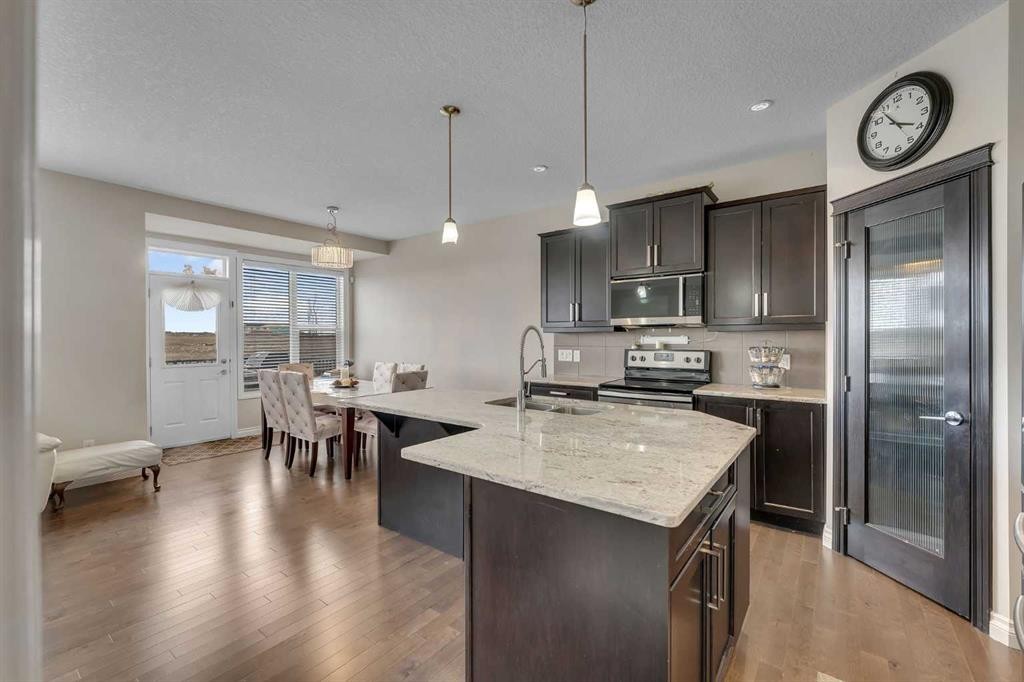 288 Evansborough Way Nw, Calgary, AB - Indoor Photo Showing Kitchen With Stainless Steel Kitchen With Upgraded Kitchen