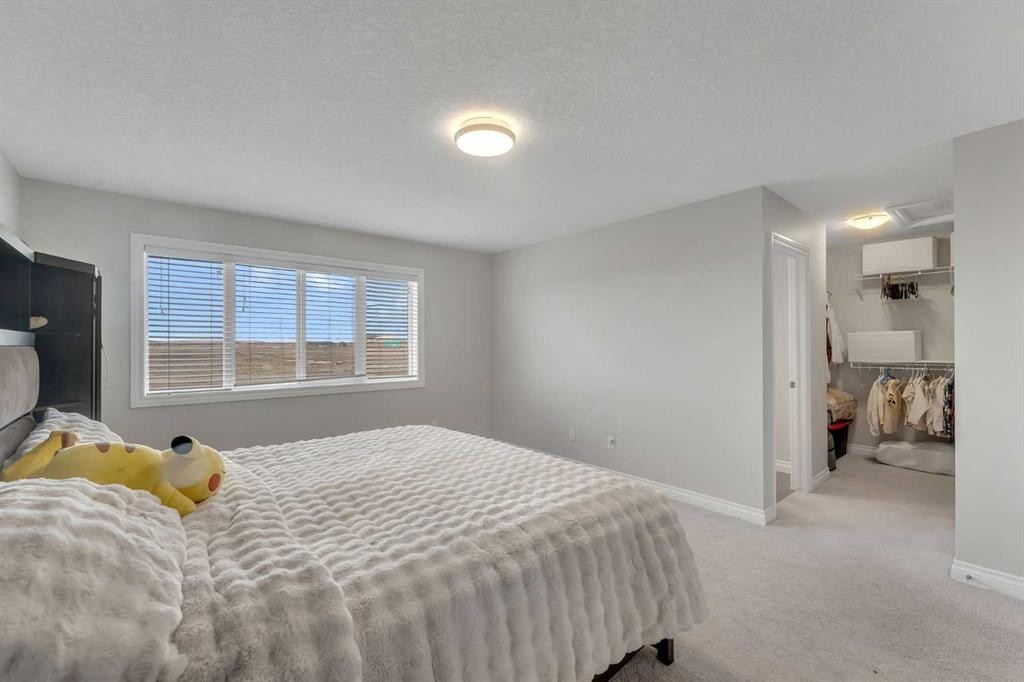 288 Evansborough Way Nw, Calgary, AB - Indoor Photo Showing Bedroom