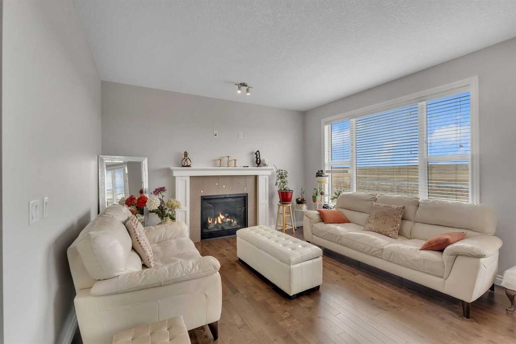 288 Evansborough Way Nw, Calgary, AB - Indoor Photo Showing Living Room With Fireplace