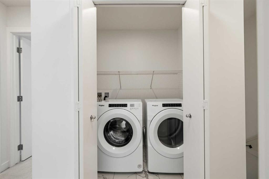 602-335 Creekside Boulevard Sw, Calgary, AB - Indoor Photo Showing Laundry Room