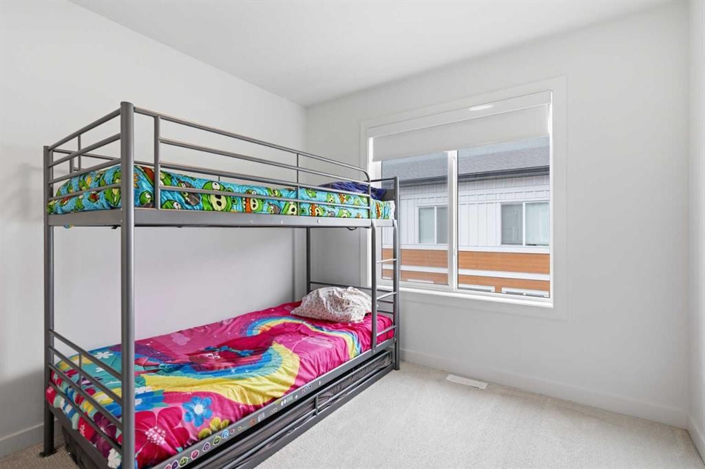 602-335 Creekside Boulevard Sw, Calgary, AB - Indoor Photo Showing Bedroom