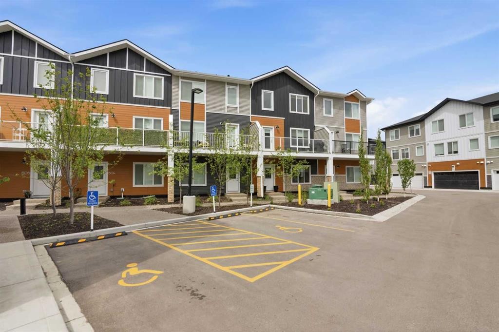 602-335 Creekside Boulevard Sw, Calgary, AB - Outdoor With Balcony With Facade