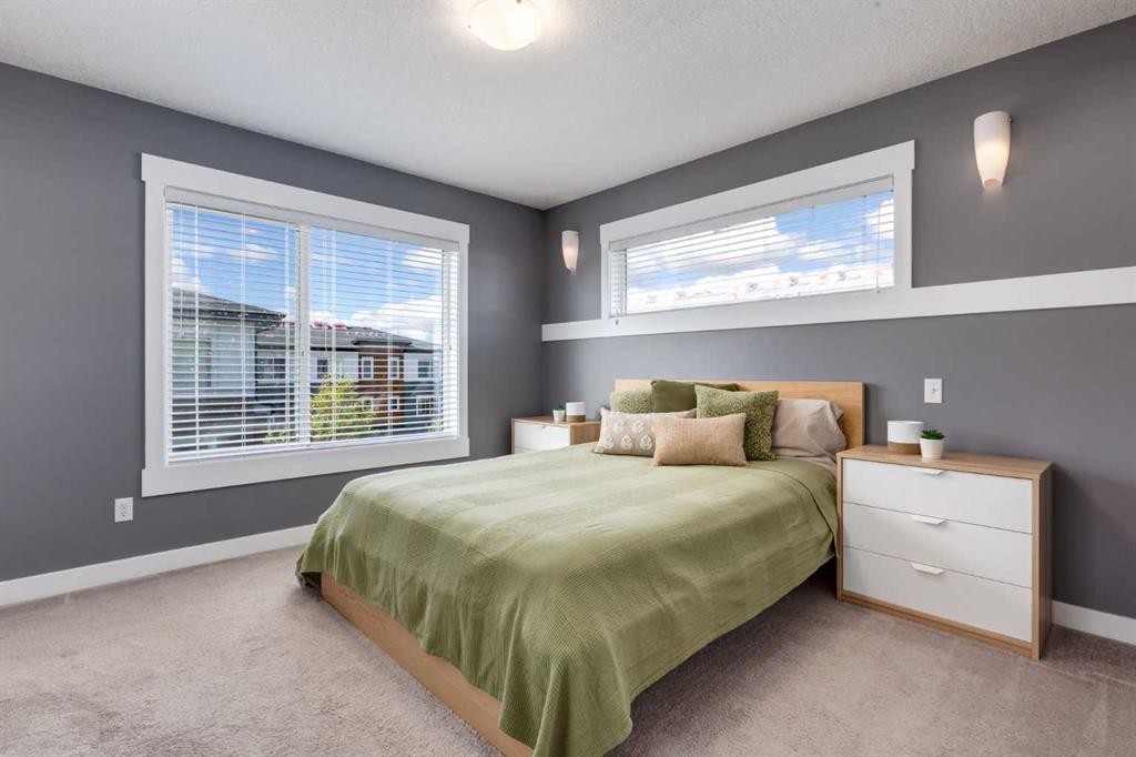 17-111 Rainbow Falls Gate, Chestermere, AB - Indoor Photo Showing Bedroom