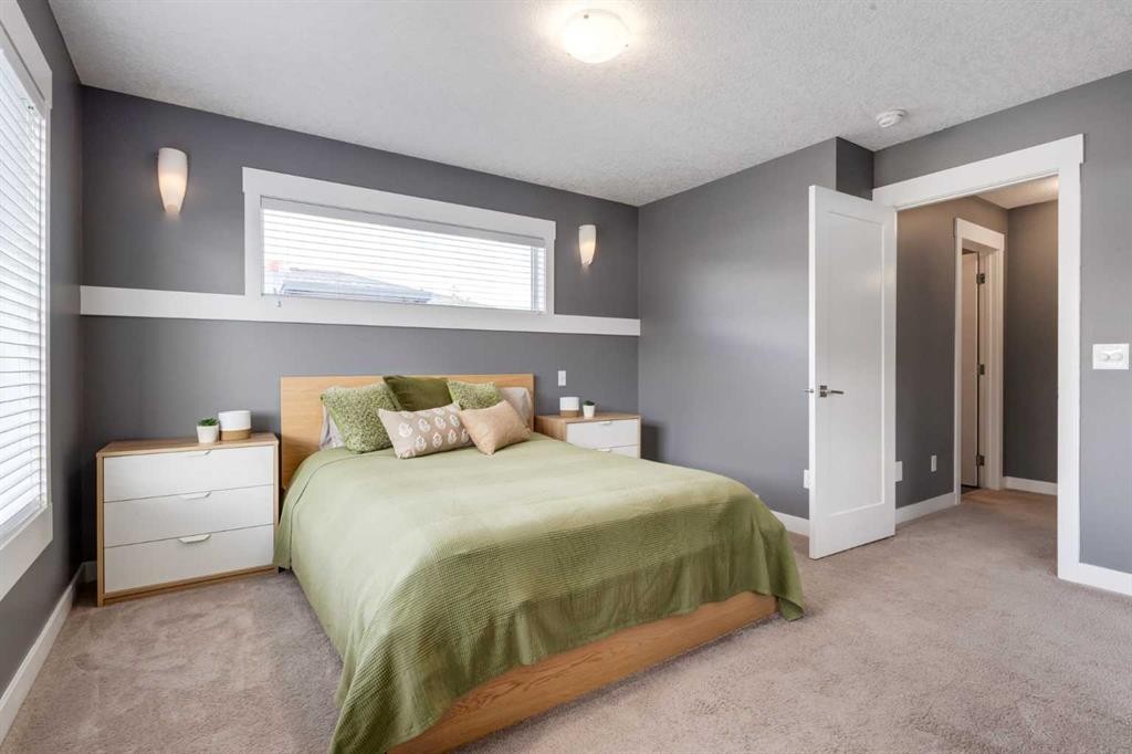 17-111 Rainbow Falls Gate, Chestermere, AB - Indoor Photo Showing Bedroom
